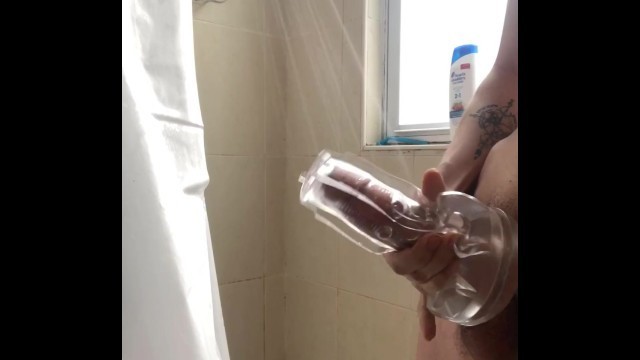 Teen uses see through Fleshlight in Shower