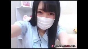 Young Asian girl in mask plays tiny pussy free webcam